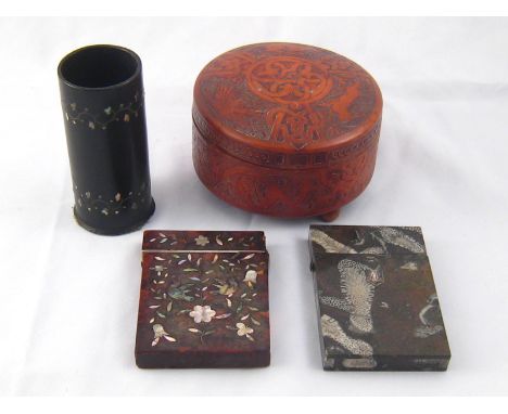 A tortoiseshell card case with m.o.p.inlaid decoration, some losses, a hardstone card case with fossil corals, and a cylindri