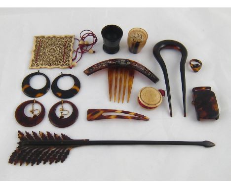 Tortoiseshell hair ornaments, being an arrow, 24cm., two double pins and a m.o.p.inlaid folding comb, two pairs of earrings, 