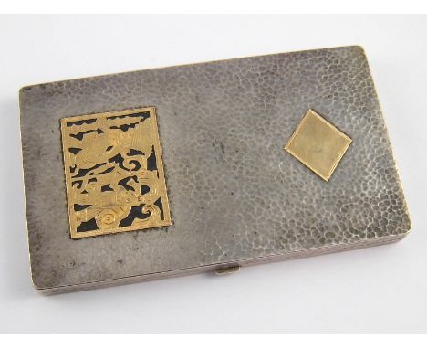 A South American heavy rectangular white metal, tests silver, cigarette case with hammered finish and yellow metal, untested 