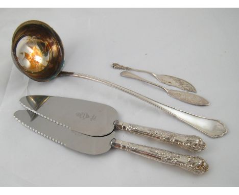 A continental silver, German 800 assay, soup ladle and two hallmarked silver butter knives, wt. 191gm. , together with two si