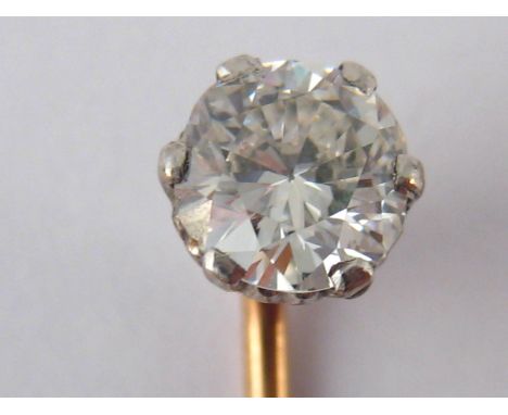 A diamond stick pin, the old brilliant cut diamond of fine colour and clarity measuring approx 6mm diameter, estimated to wei