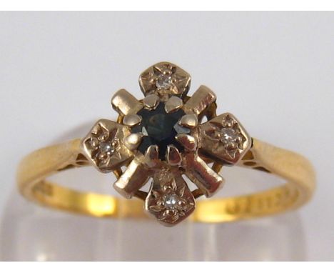 An 18 carat gold sapphire and diamond ring, size Q, 3.1 gms.