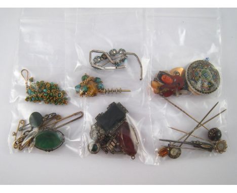 A mixed lot including brooches, bracelets, stick pins etc. All untested, including antiques, some items in need of repair.
