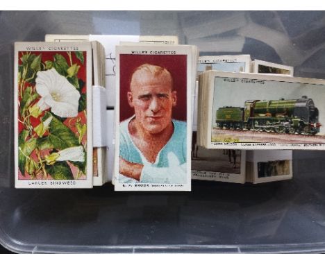 WILLS, adhesive, complete (12), inc. Radio Celebrities 1st & 2nd, Association Footballers, Safety First, Wild Flowers 1st & 2
