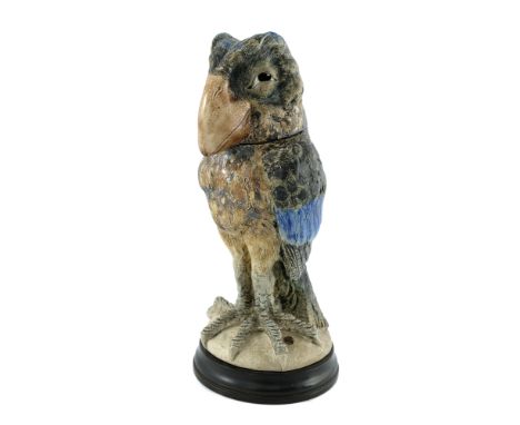 Robert Wallace Martin for Martin Brothers, a stoneware sculptural bird jar, 1898, modelled as a characterful figure, green an