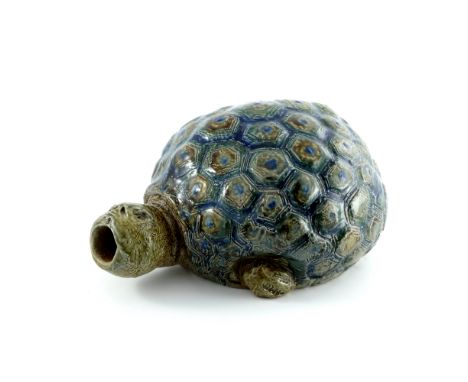 Robert Wallace Martin for Martin Brothers, a stoneware bed warmer, 1880, modelled in relief as an angry tortoise, glazed in b