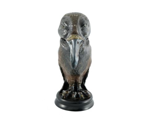 Robert Wallace Martin for Martin Brothers, a stoneware sculptural bird jar, 1884, grotesquely modelled in relief as a charact
