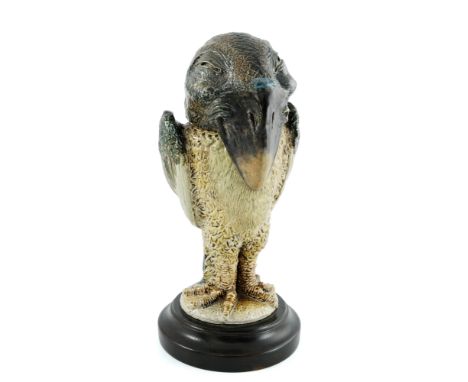 Robert Wallace Martin for Martin Brothers, a stoneware sculptural bird jar and cover, 1884/1885, modelled in relief as a char