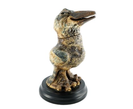 Robert Wallace Martin for Martin Brothers, a stoneware sculptural bird jar, circa 1884, modelled as a characterful figure, ro