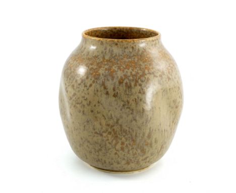 Ruskin Pottery, a Matt Crystalline vase, circa 1927, indented ovoid form, brown oatmeal over orange ochre glaze, impressed ma