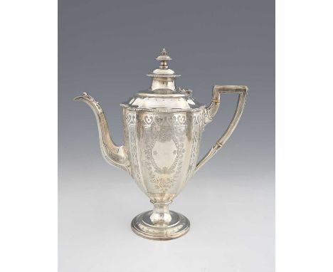 A Victorian silver pedestal coffee pot, the panelled body decorated with scrolls and foliage, with an armorial and motto, "Hu