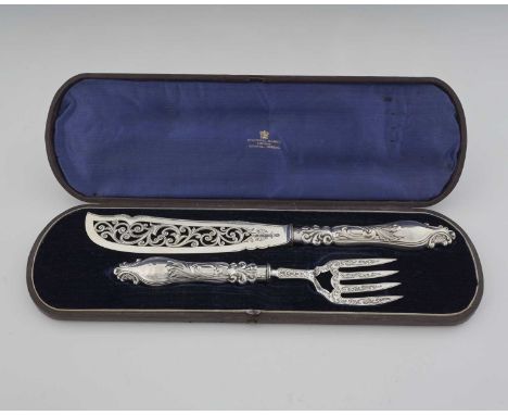 A Victorian cased silver fish serving set, comprising fork and knife, the knife with pierced and decorated blade, each blade 