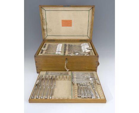 A nineteenth-century cased composite set of silver flatware, including fiddle pattern, and Celtic point, comprising fifteen S