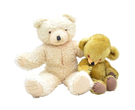 Two teddy bears, including Merrythought bear, 22cm, missing tag, with bells in ears, and 1930's teddy bear, maker unknown, mo
