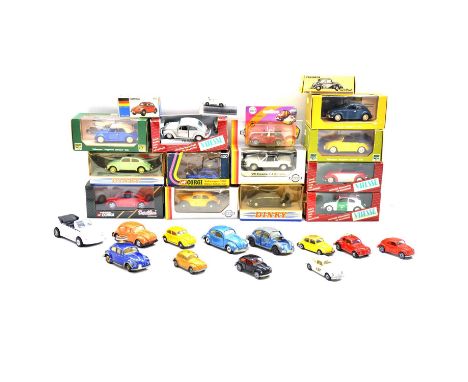 A collection of die cast model Volkswagen Beetles, including Dinky, Corgi, Vitesse, Rio and others, some boxed, with Gama min