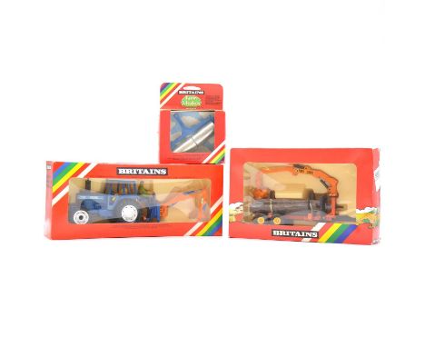 Britians farm models, three including ref. 9533 log transporter, ref. 9549 heavy roller, ref. 9598 Ford tractor and rear digg