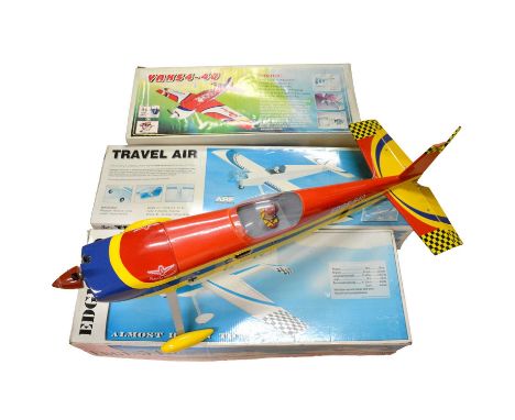 Three model aircraft ARF kits, including Seagull Models 'Edge 540', part-built, fitted with engine; Black Horse model 'Travel