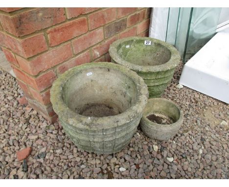 Pair of circular stone planters & 1 small planter