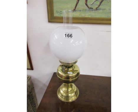 Brass paraffin lamp with globe