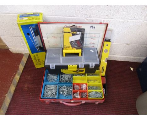 Collection of screws and tools