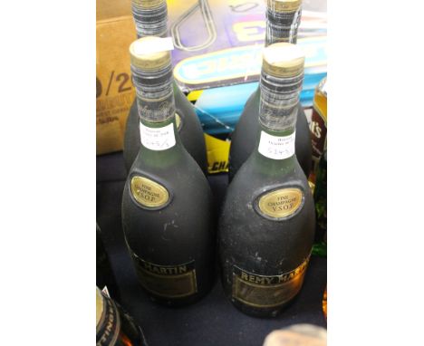 Four bottles of Remy Martin Cognac