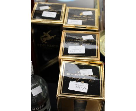 Four bottles of Remy Martin Cognac