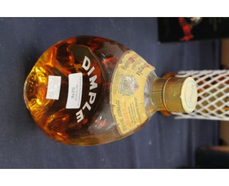 A pre 1970s Dimple Old Blended Scotch whisky bottle, by John Haig and Co 