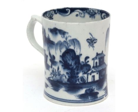 Early Lowestoft mug, circa 1762, decorated in tones of dark blue with a pagoda and willow tree and Chinese islands, the inter