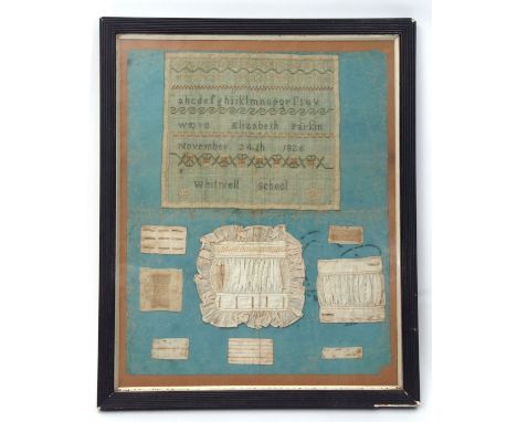 First half of 19th century framed sampler and sewing display, the ebonised and reeded rectangular frame set with a pale blue 