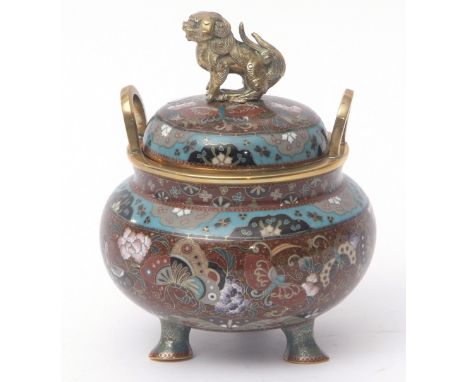 Japanese cloisonne enamel Koro and cover with tripod legs, loop handles and Shishi finial, decorated with butterflies against