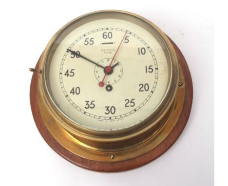 Mid-20th century brass cased ship bulkhead timepiece, Smiths "Astral", the drum shaped case with flared flange mounted on a c