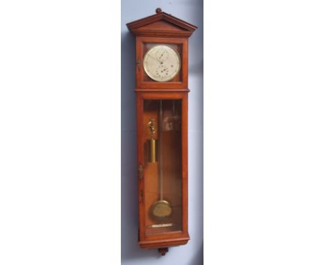 Late 19th century and later wall mounted regulator, the mahogany case with overhanging cornice with architectural pediment to