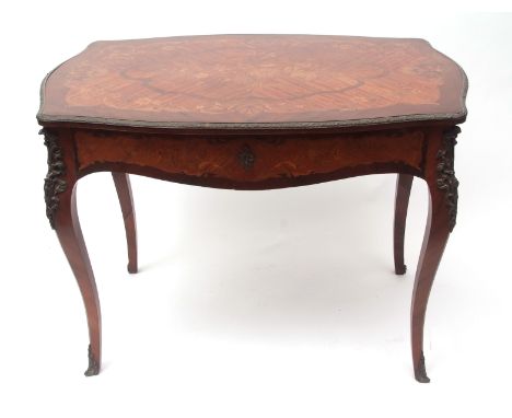 19th century French kingwood desk, oval top inlaid in the centre with panel of floral marquetry and fitted on one side with a