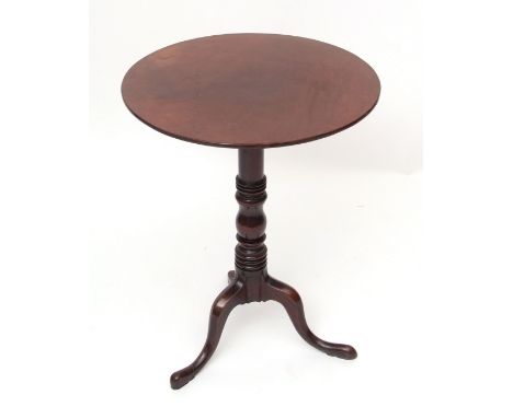 Early 19th century mahogany pedestal table, circular top raised on a ring turned support terminating in a tripod base with ho