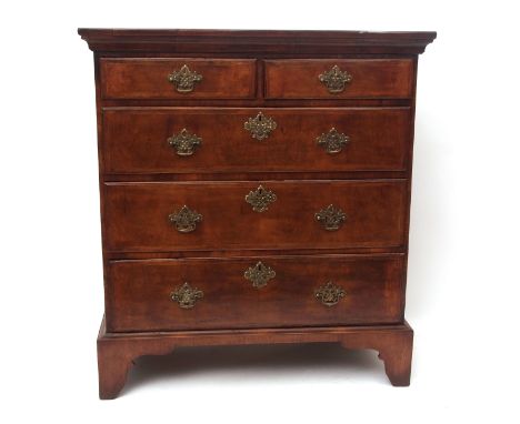 18th century and later walnut and mahogany chest, cross-banded and strung top over two short and three full width graduated d
