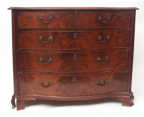 George III period mahogany secretaire chest of serpentine form, flame mahogany top with moulded edge over fitted upper drawer