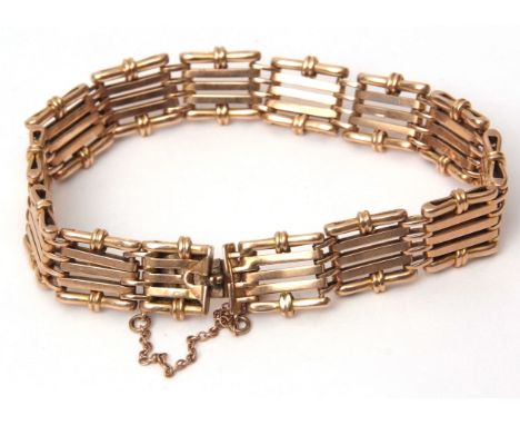15ct stamped five-bar gate bracelet, safety chain fitting, 20.2gms  