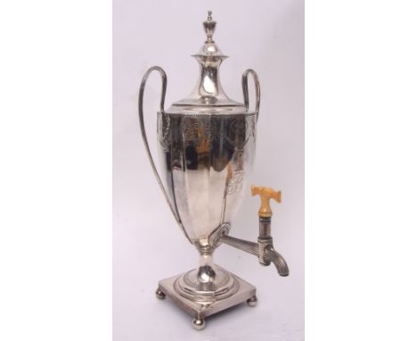 George III tea urn with bladed and waisted pull off cover with engraved border and cast and applied urn shaped finial to a lo