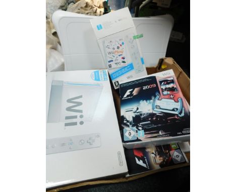 A Nintendo Wii, with console, stand, plate, remote, sensor box, etc. (boxed), Wii Play, remote, accessory, Formula 1 2009, Ba