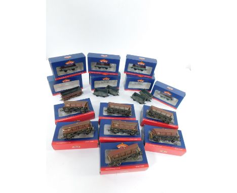 Four Bachmann Branch Line OO guage 16T Steel Mineral Wagons, BR grey, 37-225F, together with eight HSA Hopper Wagons, BR Balk
