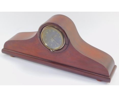 A Smiths analogue car dashboard clock, circular black dial bearing Arabic numerals, H-47.405., within a mahogany mantel clock