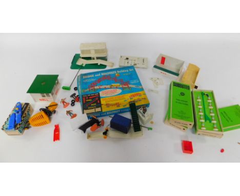 Subbuteo, including four teams, boxed., Scalextric accessories, figures, etc., together with a Chad Valley Bridge and Roadway