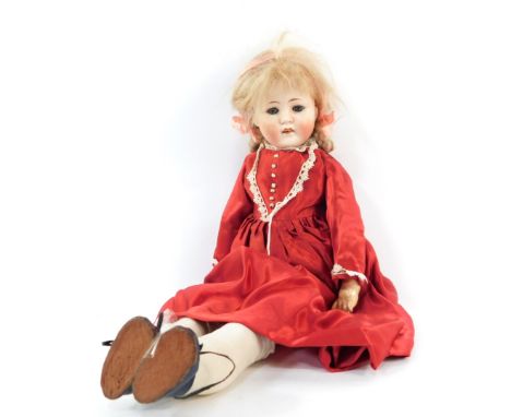 A Max Handwerck Bebe Elite bisque head doll, No 286/0 1/2., modeled with blue eyes, open mouth, with jointed arms and legs, 5