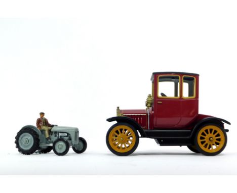 A Britains die cast model of a Ferguson TE20 tractor, Golden Anniversary 1996, together with a Schuco clockwork tin plate mod