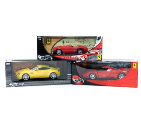 Hotwheels die cast model cars, scale 1:18, comprising a 166MM Barchetta., Aston Martin V8 Vantage., and a Ferrari Luno, all b