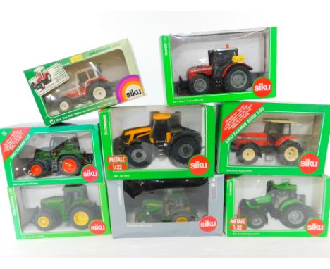 Eight Siku Farmer Series die cast models of tractors, scale 1:32, boxed.