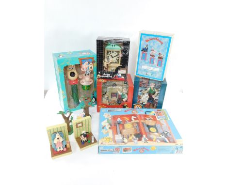 Wallace and Gromit collectables, including a Wesco talking radio alarm clock, Moving alarm clock, Toppers, torch and an Adven