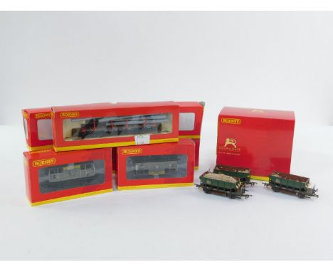 Hornby OO gauge wagons, including a six plank wagon, Hornby Roadshow 2010 R6503., BR brake van ZTR 'KDB594164'., and packs of