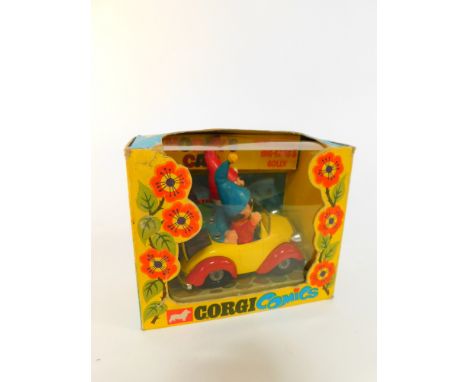 A Corgi Comics 801 Noddy's Car with Big Ears &amp; Golly die cast model vehicle, yellow and red body with chrome trim, boxed.