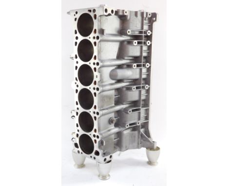 A BMW M52 standard engine cylinder block, 1748450, converted to a wine rack, 65cm high.